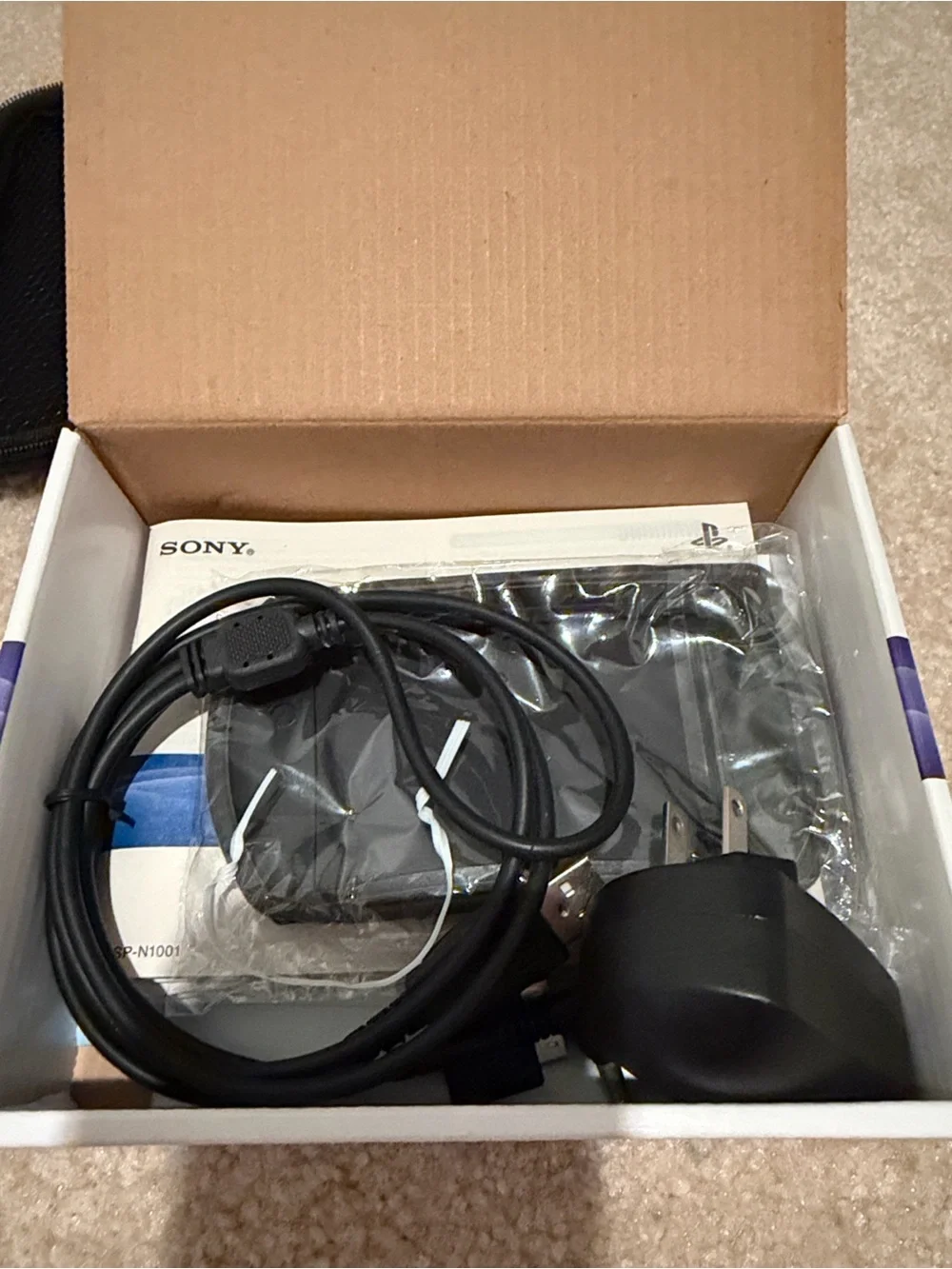 Sony PSP Go Portable Gaming System in Black and Purple